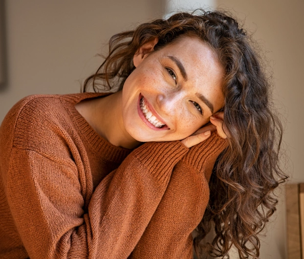 Women showing her healthy teeth