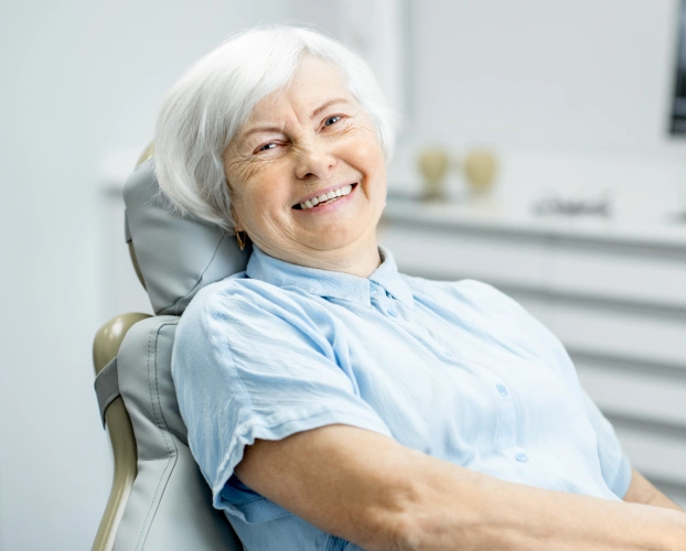 Dentist performing root canal treatment